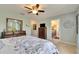 View of the bedroom featuring furnishings and en suite bathroom at 12328 Streambed Dr, Riverview, FL 33579