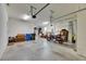 Three car garage offers a large space for vehicles, storage, and other equipment or hobby areas at 12328 Streambed Dr, Riverview, FL 33579