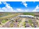 Enjoy this home's aerial view from the neighborhood, with proximity to parks, restaurants and a main highway at 16316 Silent Sands Ln, Odessa, FL 33556