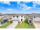 A high-angle view showcases this home's position in a neighborhood with manicured lawns and well-maintained exteriors at 16316 Silent Sands Ln, Odessa, FL 33556
