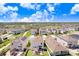The charming backyard patio invites relaxation and gatherings, and the well-maintained lawn enhances the home's curb appeal at 16316 Silent Sands Ln, Odessa, FL 33556