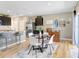 A modern dining area featuring an eat-in kitchen with stainless steel appliances, perfect for entertaining and Gathering meals at 16316 Silent Sands Ln, Odessa, FL 33556