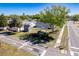 Scenic backyard featuring a patio, shed, landscaping, with sidewalks adjacent, nestled amid lush greenery at 1766 10Th Sw St, Largo, FL 33778