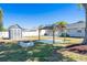 Backyard featuring a shed, gazebo, and a fire pit area perfect for outdoor entertainment at 1766 10Th Sw St, Largo, FL 33778