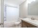 Well-lit bathroom featuring a shower-tub combination, toilet, and vanity with modern fixtures at 1766 10Th Sw St, Largo, FL 33778