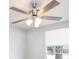 Bedroom showing ceiling fan and a window at 1766 10Th Sw St, Largo, FL 33778