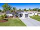Well-maintained single-Gathering home with a one-car garage, neatly landscaped yard, and welcoming front entrance at 1766 10Th Sw St, Largo, FL 33778