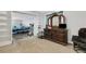 Spacious bedroom with open shelving and a view into the next bedroom at 1988 58Th N St, St Petersburg, FL 33710