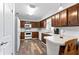 Kitchen featuring wooden cabinetry and modern appliances at 202 New Hope Rd, Brandon, FL 33510