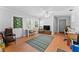 Living area featuring hardwood flooring and natural light at 202 New Hope Rd, Brandon, FL 33510