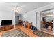 Living area with ceiling fan, hardwood floors, and ample space at 202 New Hope Rd, Brandon, FL 33510