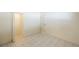 Neutral bedroom with tiled floor and an open closet area at 2302 Azalea Dr, Palm Harbor, FL 34683