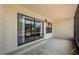 A covered patio provides scenic outdoor living with direct access to backyard landscaping and water at 2571 Cyprus Dr # 1-105, Palm Harbor, FL 34684