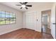 Cozy bedroom featuring a closet and a window overlooking the outdoors at 2715 Willow Oaks Dr, Valrico, FL 33594
