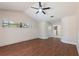Bright bedroom with hardwood floors, fresh paint, a ceiling fan, and ample closet space at 2715 Willow Oaks Dr, Valrico, FL 33594