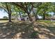 A charming house with mature trees, providing plenty of shade and curb appeal at 2715 Willow Oaks Dr, Valrico, FL 33594