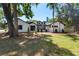 Charming single-story home with manicured lawn and mature trees offers great curb appeal at 2715 Willow Oaks Dr, Valrico, FL 33594