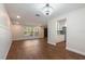 Spacious living room with an open layout and hardwood floors that flow into the dining area at 2715 Willow Oaks Dr, Valrico, FL 33594