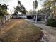 Large backyard with room for entertainment and a playset at 287 Belleair Ne Dr, St Petersburg, FL 33704