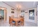 Charming dining room featuring a classic wooden table set and warm, inviting decor at 3051 Shady Creek Dr, Wesley Chapel, FL 33543