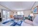 Cozy living room featuring comfortable seating, natural light, and stylish decor at 3051 Shady Creek Dr, Wesley Chapel, FL 33543