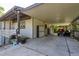 Functional carport area featuring ample storage and space for parking with easy backyard access at 317 Old East Lake Rd, Tarpon Springs, FL 34688