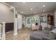 Comfortable living room with modern decor, hardwood floors, and recessed lighting at 317 Old East Lake Rd, Tarpon Springs, FL 34688