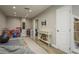 A portion of a large playroom with hard wood floors, recessed lighting, and wall decor at 317 Old East Lake Rd, Tarpon Springs, FL 34688