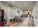 Large, well-lit playroom with neutral walls, hardwood floors, and ample space for activities at 317 Old East Lake Rd, Tarpon Springs, FL 34688