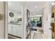 Inviting entryway with light wood floors, modern decor, and view of the living room at 36750 Us 19 N # 17106, Palm Harbor, FL 34684