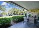 Relaxing patio with seating offers views of manicured lawn and convenient parking at 36750 Us 19 N # 17106, Palm Harbor, FL 34684