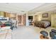 Spacious living area with adjacent bedroom and kitchen providing an open concept layout at 36750 Us 19 N # 22207, Palm Harbor, FL 34684