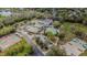 Aerial view of the community center with a playground, tennis courts, and parking at 4015 Mountain Springs Ln, Tampa, FL 33624