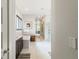 Bright bathroom with a soaking tub, walk-in glass shower, and double vanity sinks at 4117 W Platt St, Tampa, FL 33609