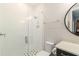 Bathroom featuring a glass shower and classic finishes at 4117 W Platt St, Tampa, FL 33609