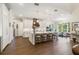 Spacious kitchen with a large island, bar seating, stainless steel appliances, and hardwood floors at 4117 W Platt St, Tampa, FL 33609