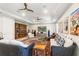 Comfortable living room with large rug and multiple seating areas at 4117 W Platt St, Tampa, FL 33609