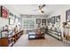 Bright living room with sports memorabilia and natural light at 4117 W Platt St, Tampa, FL 33609