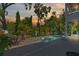 A tranquil backyard features a custom pool and outdoor kitchen, perfect for relaxation and entertaining at 4117 W Platt St, Tampa, FL 33609