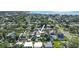 An aerial view of the property showcasing its location among the mature tree cover at 4126 Harrisburg Ne St, St Petersburg, FL 33703