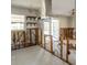 Renovated kitchen featuring new tile flooring, updated electrical, and open shelving for a modern, stylish look at 4126 Harrisburg Ne St, St Petersburg, FL 33703