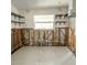 Renovated kitchen featuring new tile flooring, updated electrical, and open shelving for a modern, stylish look at 4126 Harrisburg Ne St, St Petersburg, FL 33703
