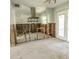 Remodeled kitchen showcases the framing, layout and plumbing of the design with modern elements such as lighting at 4126 Harrisburg Ne St, St Petersburg, FL 33703