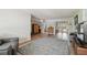 Spacious living room with a hardwood floor, neutral decor, and ample natural light at 4126 Harrisburg Ne St, St Petersburg, FL 33703