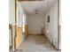 Spacious unfinished room with exposed wiring, needing renovation to realize its potential at 4126 Harrisburg Ne St, St Petersburg, FL 33703