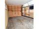 Interior of sunroom featuring bare walls and floors, and sliding glass doors at 4126 Harrisburg Ne St, St Petersburg, FL 33703