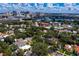 Aerial view of a neighborhood near the bay showcasing city skyline views and lush landscaping at 43 Aegean Ave, Tampa, FL 33606