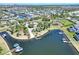 Community featuring lush green spaces, boat docks, and a picturesque lake view at 5128 Admiral Pointe Dr, Apollo Beach, FL 33572