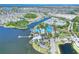 Aerial view of community with beautiful waterfront access, community pool, clubhouse, boat dock, and picturesque lake at 5128 Admiral Pointe Dr, Apollo Beach, FL 33572