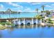 Scenic view of a bridge over tranquil water, enhanced by lush landscaping and clear blue skies at 5128 Admiral Pointe Dr, Apollo Beach, FL 33572